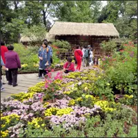 Flower beds and visitors in the Humble Administrator’s Garden