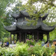 Traditional pavilion surrounded by greenery in the Humble Administrator’s Garden