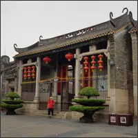 Traditional Lingnan building decorated with red lanterns at Lingnan Impressions Park.