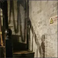 Narrow staircase leading to the second floor of a traditional building.