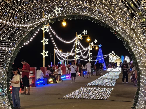 Close-up of New Year’s lights and decorations on Saranwithi Pier