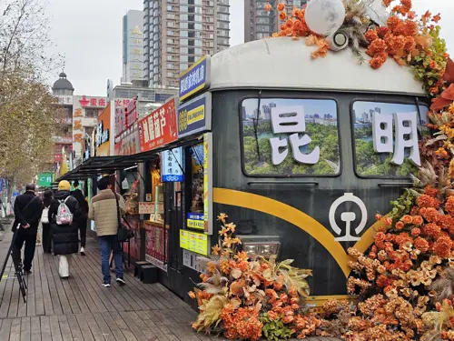 Old train converted into food stalls at a street market in China.