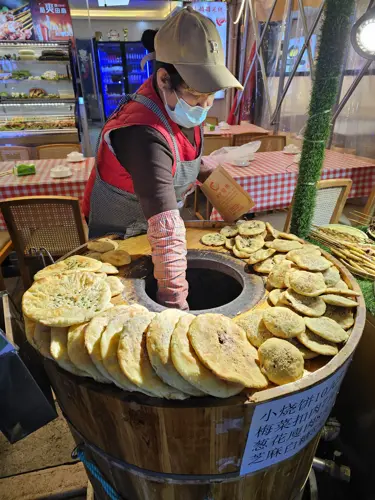 Old train converted into food stalls at a street market in China.